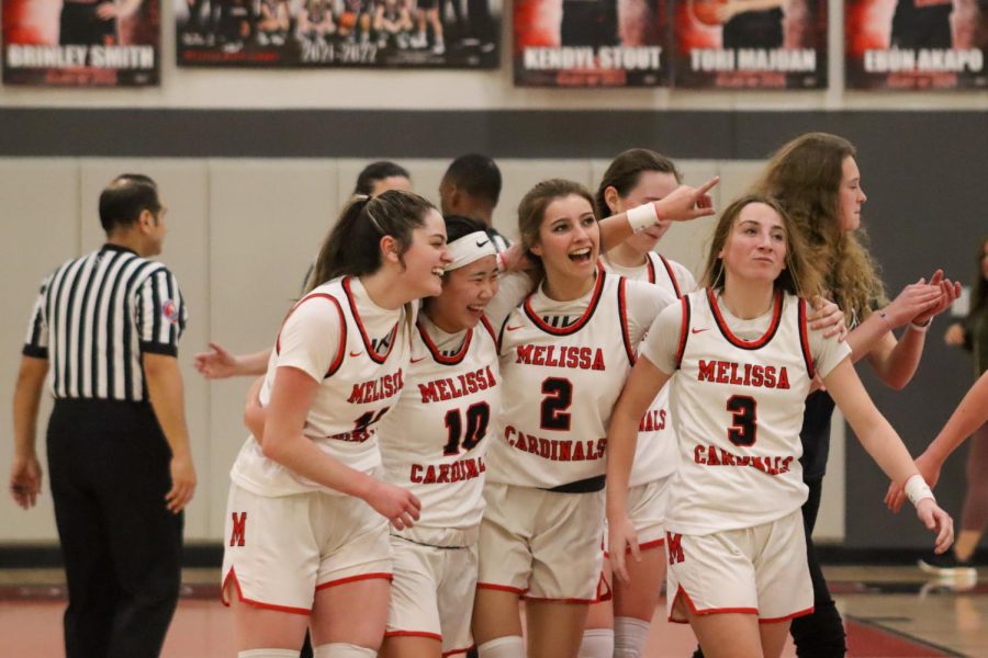 The Lady Cards celebrate their victory over Aubrey 42-39 in their final home game of the season on Feb. 8. 