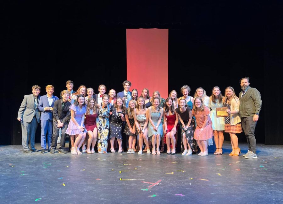 The One-Act Play cast, crew and directors pose for a picture while accepting their award at Regionals.