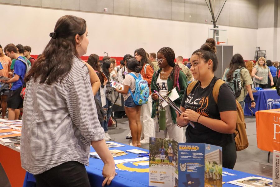 Juniors and seniors attend a College Fair on Sept. 15. There were 83 booths ranging from junior colleges to universities to military branches.