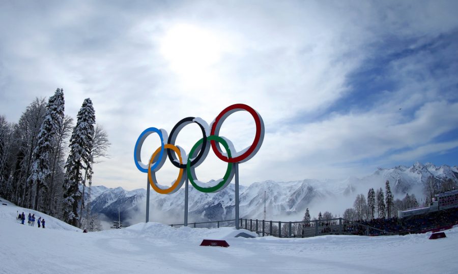 SOCHI%2C+RUSSIA+-+FEBRUARY+19%3A++Mist+rises+behind+the+Olympic+Rings+during+day+12+of+the+Sochi+2014+Winter+Olympics+at+Laura+Cross-country+Ski+%26amp%3B+Biathlon+Center+on+February+19%2C+2014+in+Sochi%2C+Russia.++%28Photo+by+Julian+Finney%2FGetty+Images%29
