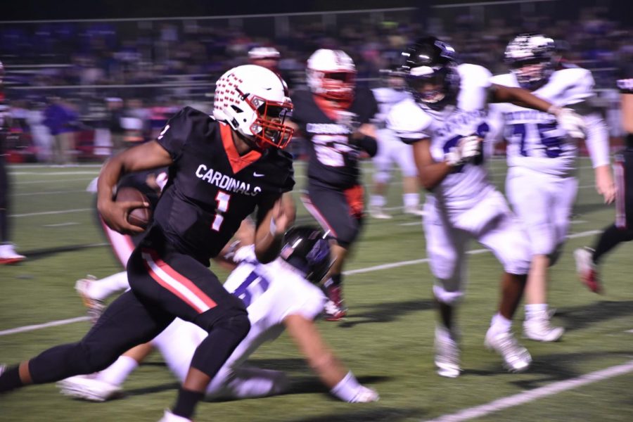 Rushing
Quarterback Brendon Lewis attempts to run the ball toward the end zone during the Cardinals landslide win over Anna on Friday, winning 47-0.  photo by Haley Ellis, photo 1 student. 