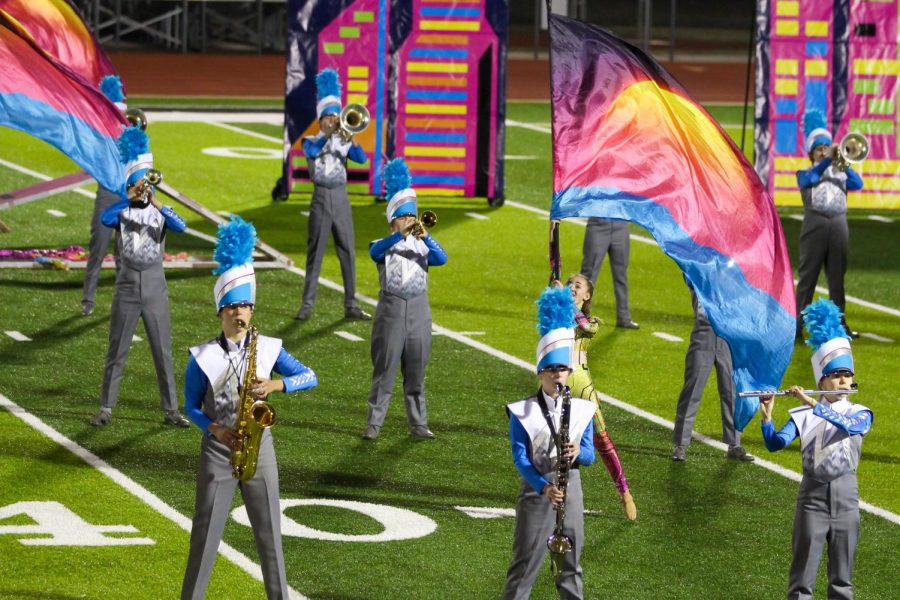 The+Mighty+Cardinal+Band+showcases+RetroVision+for+family+and+friends+the+night+before+their+area+contest.+They+placed+in+the+top+four+and+advanced+to+the+UIL+4A+State+Marching+Contest%2C+which+will+be+held+Dec.+14+in+San+Antonio.
