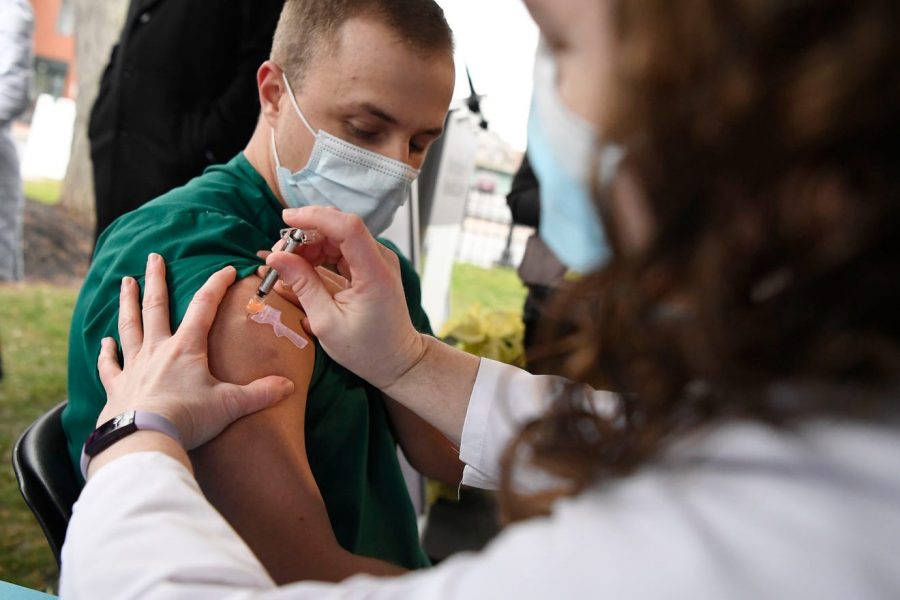 Americans begin recieving COVID-19 vaccines.