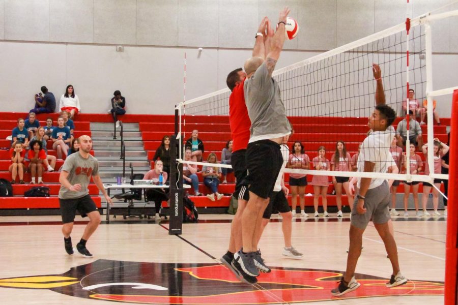 Coaches+Pitzer+and+Kiefer+block+the+ball+in+a+faculty+vs+seniors+volleyball+match+during+Field+Day%2C+May+21.