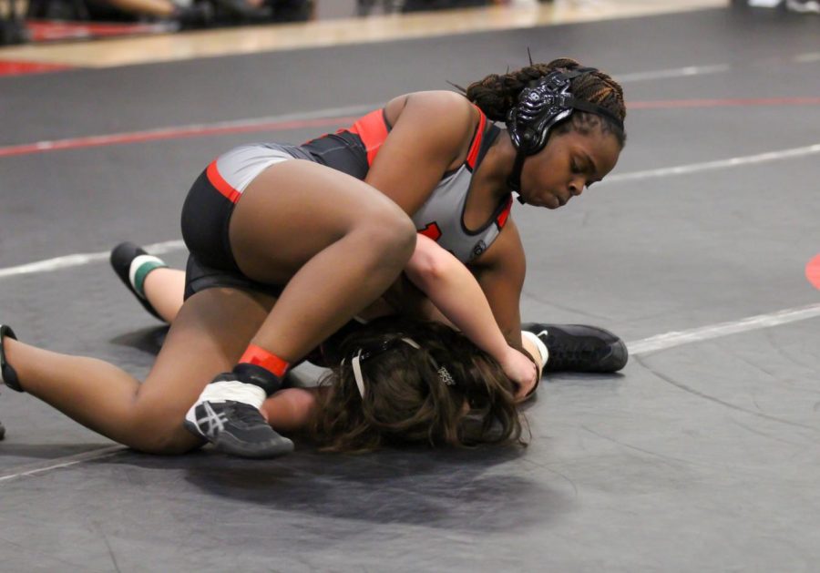 Junior Vanessa Nnabuike wins her dual with a pin against a Carrollton Ranchview opponent on Dec. 8.