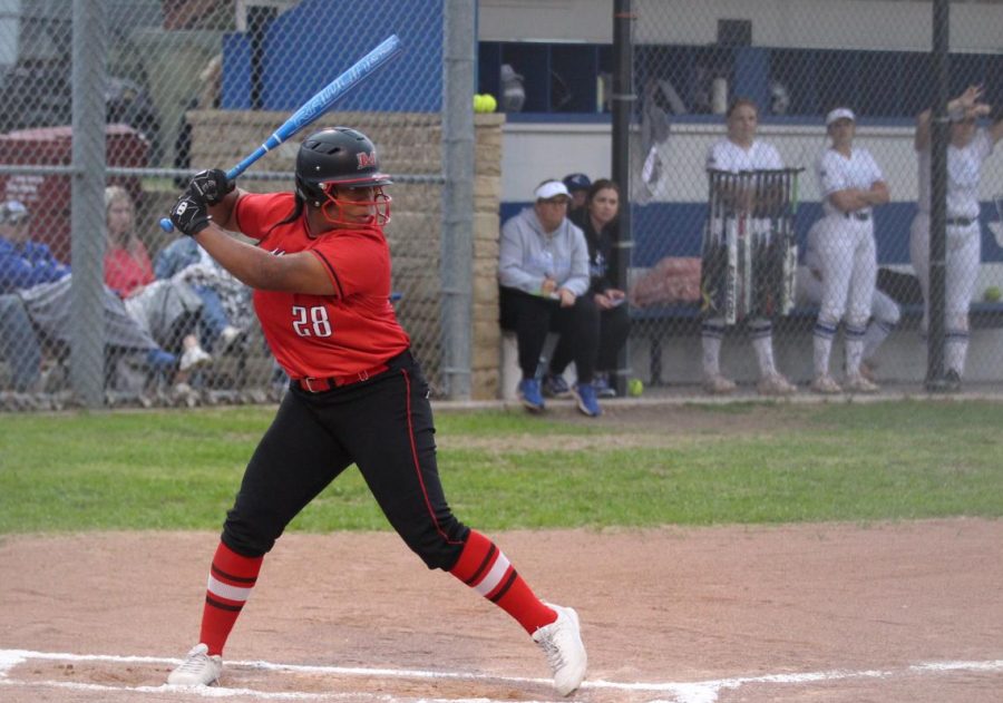 Senior Rachel Wells prepares to bat. The Lady Cardinal Varsity Softball Team clinched the district championship title with their victory over Van Alstyne on April 19.