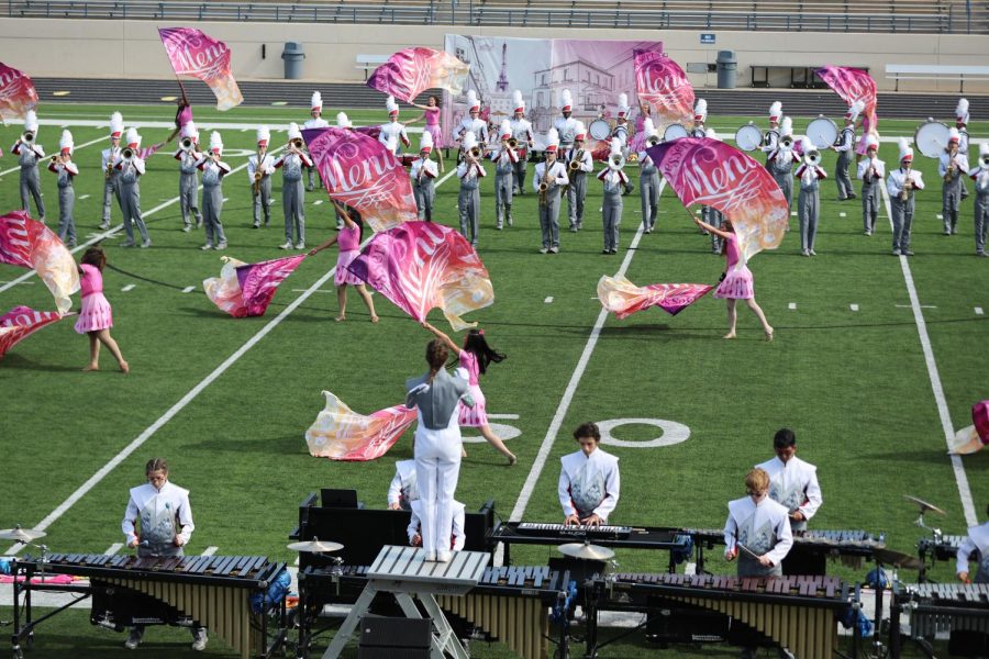 The band performs their show Bon Appetit at the UIL Region 25 Marching Contest on Oct. 15 at Kimbrough Stadium in Murphy.