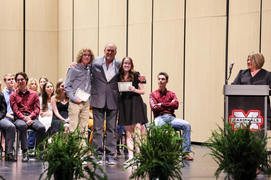 Seniors Maisy Gustaveson and Noah Lakey receive their MEF Scholarships at the ceremony held on May 4.