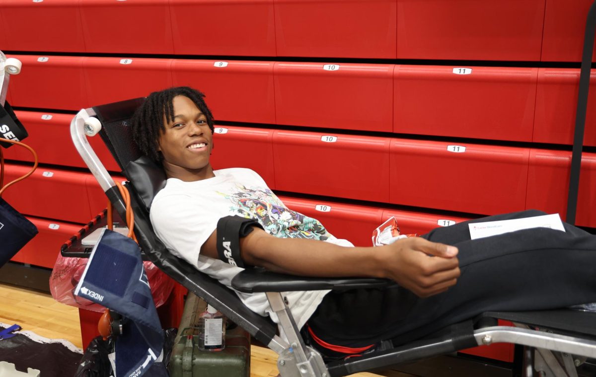 Students donate blood at the fall drive sponsored by HOSA on Oct. 4.