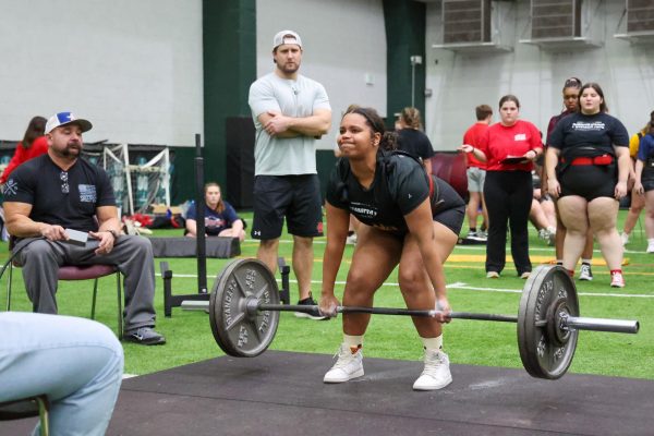 The Lady Cardinal Powerlifting Team competes at the Prosper meet on Feb. 1.