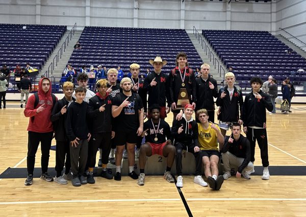 The varsity boys team wins the regional championship.