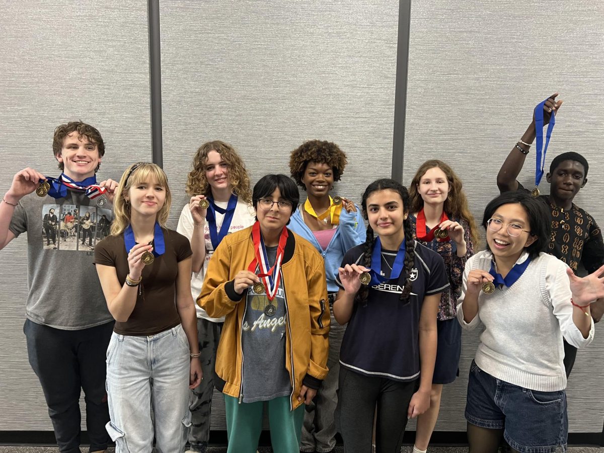 Art+students+pose+with+their+awards+from+the+regional+VASE+competition+held+in+February+in+Frisco.+Two+students%2C+AnaBelle+Gonzales+and+Logan+Venner%2C+advanced+to+the+state+level+of+competition.
