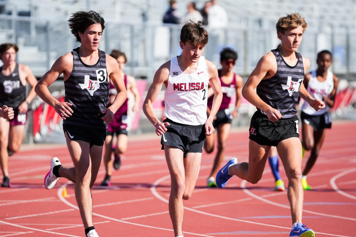 Senior+Logan+Tauch+competes+in+the+3200m+race+at+the+District+13-5A+Track+Meet+held+on+April+3-4+in+Lovejoy.