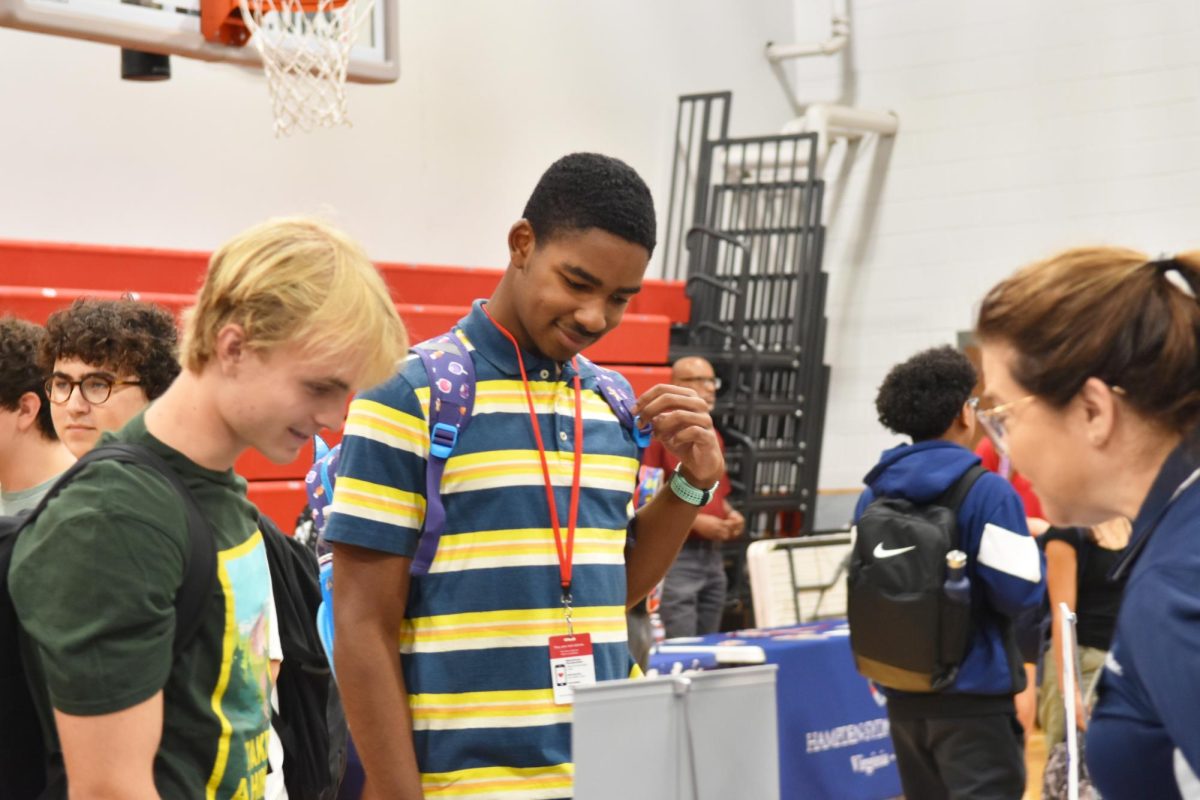 Juniors and seniors attend a college fair on campus Sept. 12. Approximately 90 vendors presented information to students, representing junior colleges, universities and the military.