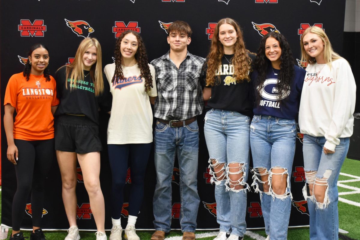 Seven senior athletes sign their National Letter of Intent on Nov. 13.