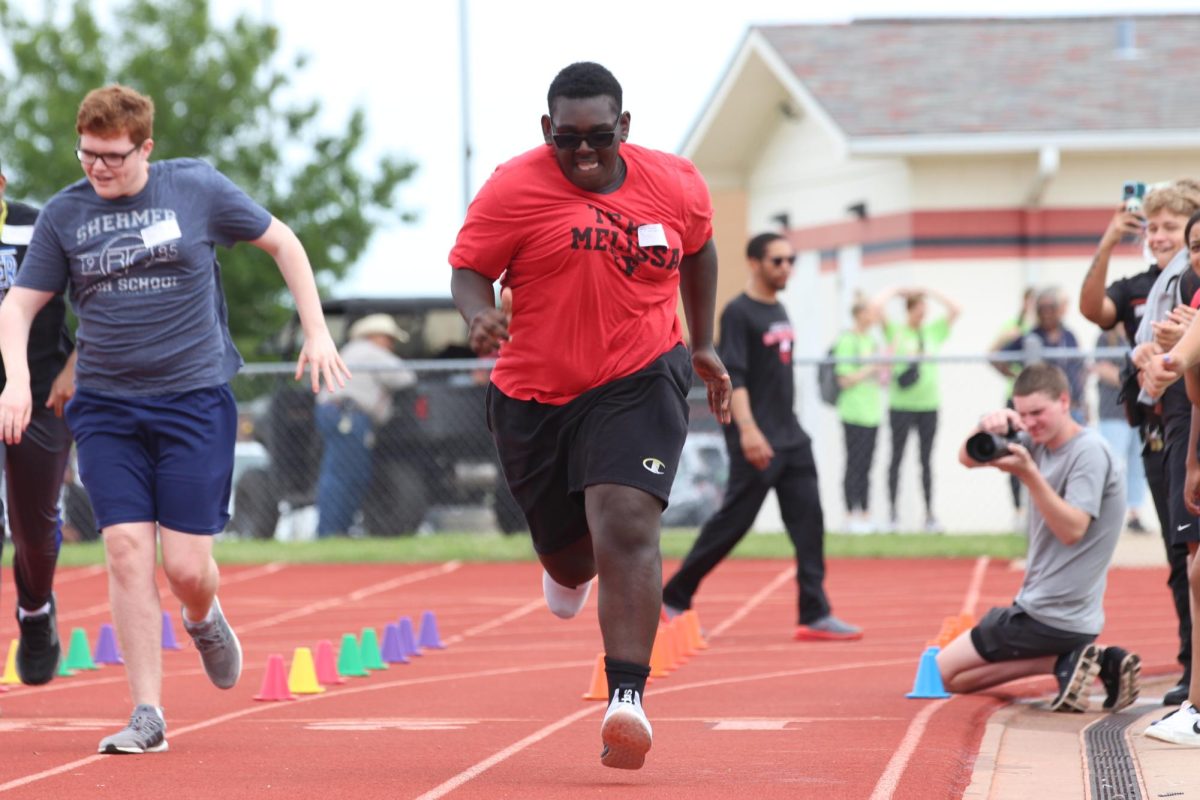 Senior Terryon Clincy competes in his running event at the 14th Annual Melissa Special Olympics Track Meet held April 25 at Cardinal Stadium.