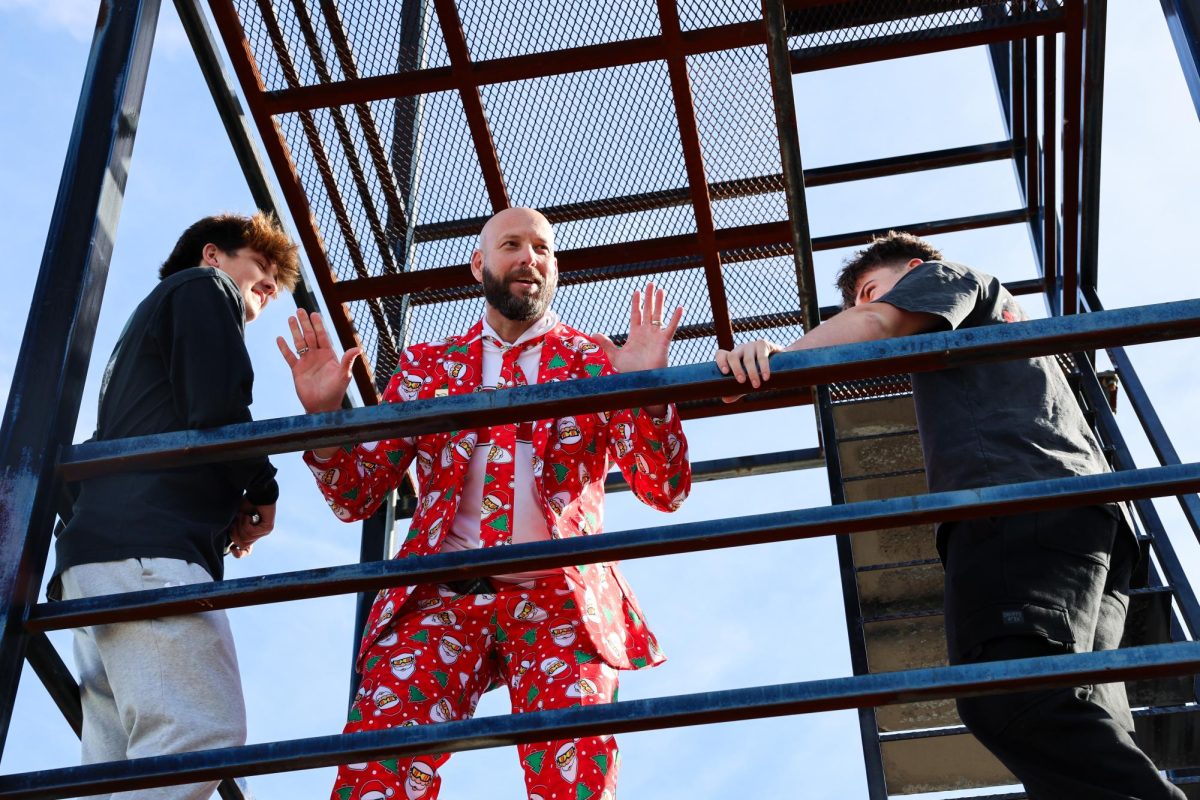 Before getting his beard shaved, Principal Marcus Eckert lets the crowd know his wife will stop speaking to him as a result.